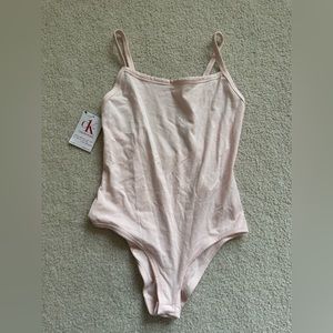 Calvin Klein light pink sleeveless bodysuit